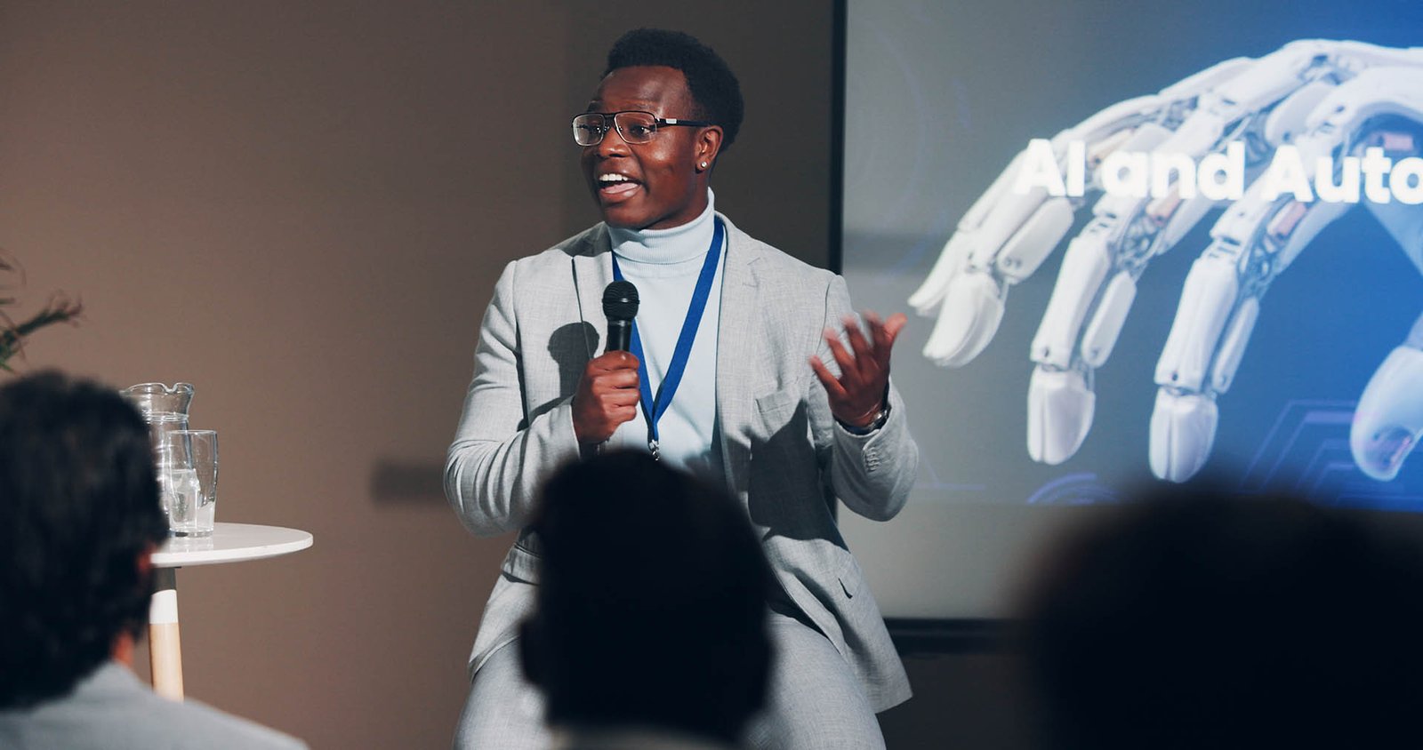 black-man-speaker-and-mic-for-presentation-speech-2026-01-09-11-02-23-utc